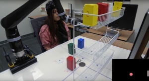Noninvasive EEG-Based Control of a Robotic Arm for Reach and Grasp Tasks