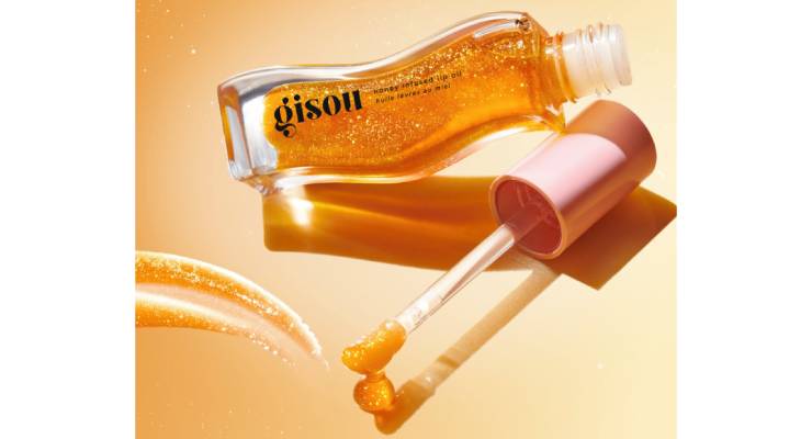 Gisou Launches Honey Infused Lip Oil Golden Shimmer Glow